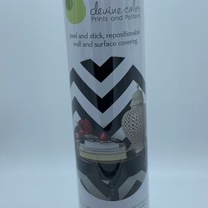 DEVINE COLOR PRINTS & PATTERN PEEL AND STICK SURFACE COVERING.